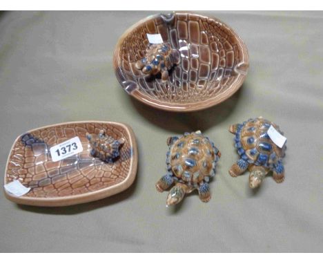 A large Wade porcelain tortoise decorated ashtray, a smaller similar and two tortoise form trinket boxes