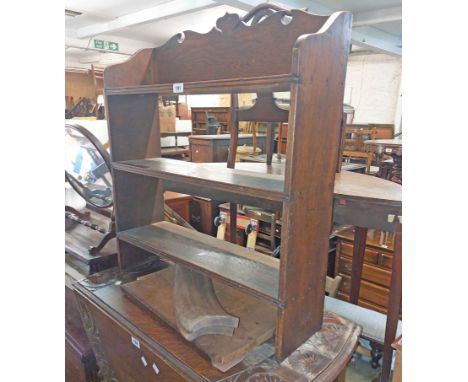 A 70cm early 20th Century oak three shelf open bookcase