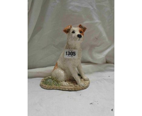 A Brenda Garner ceramic sculpture, depicting a terrier dog