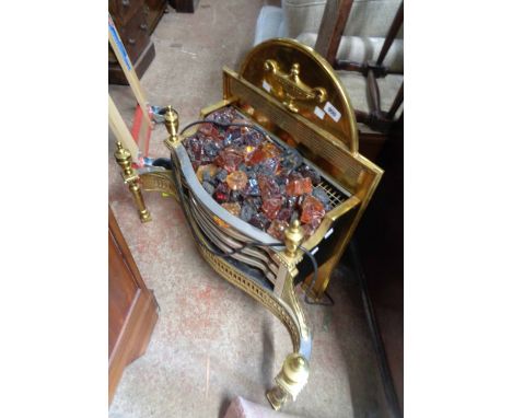 A brass and chrome plated electric fire, in the regency grate style with coloured glass light up 'coals'