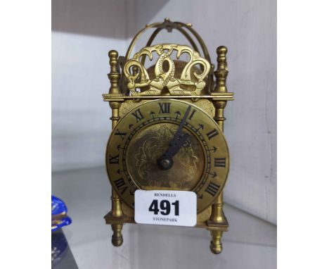 A vintage brass lantern style timepiece with Smiths electric movement - sold as a collectors' item only