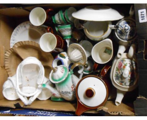 A box containing a quantity of ceramics including Poole Pottery part coffee set, etc.