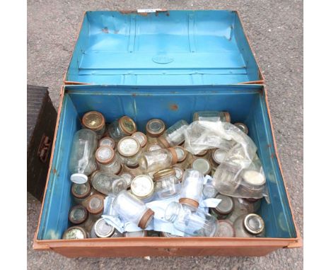 A metal trunk containing a quantity of Kilner jars