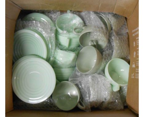 A box containing a quantity of French Art Deco green ovenproof glass cups and saucers - sold with a small quantity of Spode p