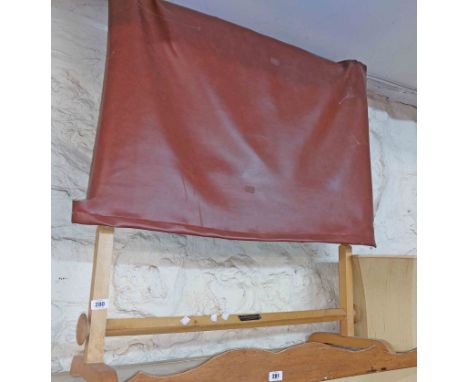 A Lawrance &amp; Lowings blonde wood tapestry frame with cover and splayed legs