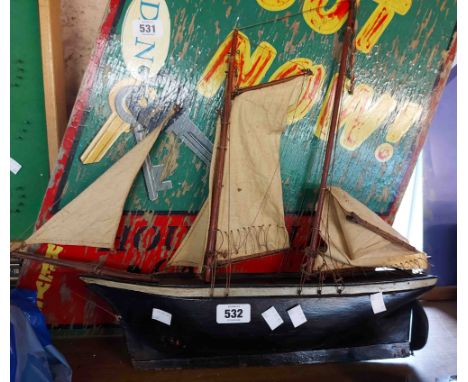 A vintage handmade model ship