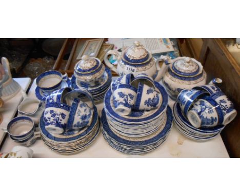 A quantity of Booth's Real Old Willow pattern dinner and teaware including teapot, coffee pot, milk jug, sucrier, teacups, co
