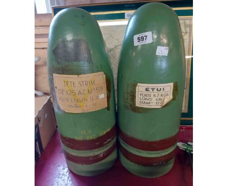 Two vintage green French practice mortar rounds