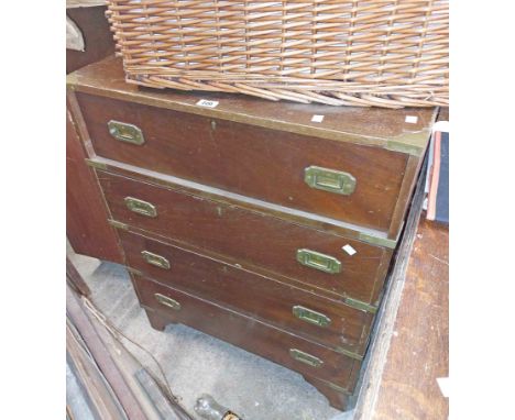 A 74cm vintage stained mixed wood campaign style secretaire chest with part fitted fall-front writing drawer and three long d