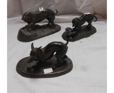 Three 19th Century spelter dog studies with bronze effect finish