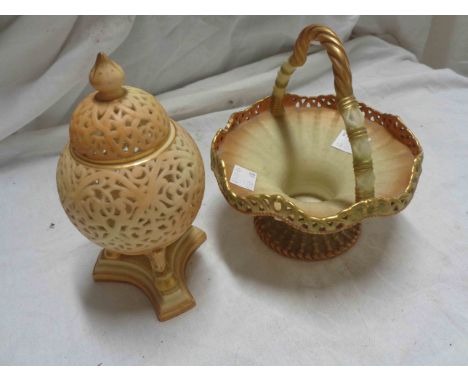 A late 19th Century Royal Worcester porcelain basket with basket weave moulding, pierced rim and rope effect handle with a gr