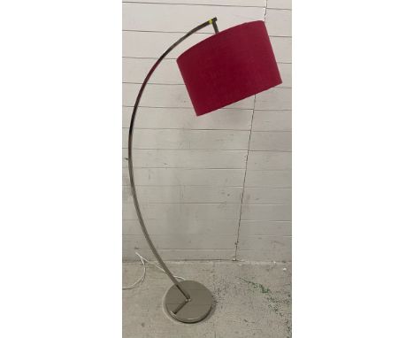 A contemporary floor standing arch floor lamp 