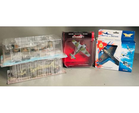 Four Aviation model planes and helicopters