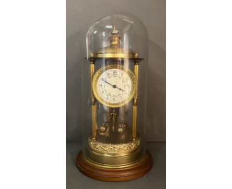A Gilt and brass 400 day anniversary clock