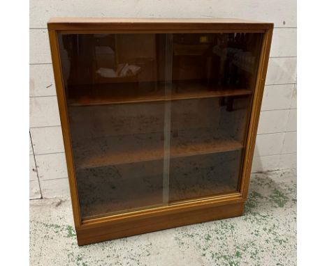 A mid century glazed two shelf bookcase, 69 X 28 x H77 cm