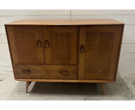 An Ercol mid-century sideboard with two cupboards and one long drawer H82114 X 48 