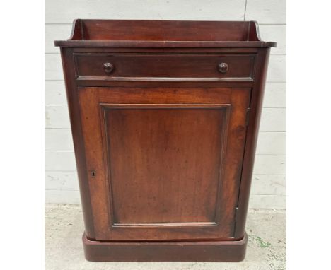 A small mahogany side board comprising of a single long drawer with a three shelf cupboard under and a galleried top Height 1
