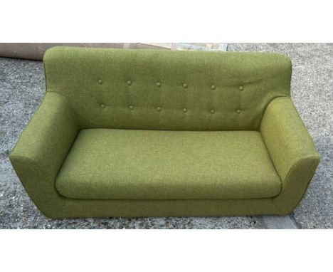 A children's green two seater sofa (W135cm D70cm H57cm)