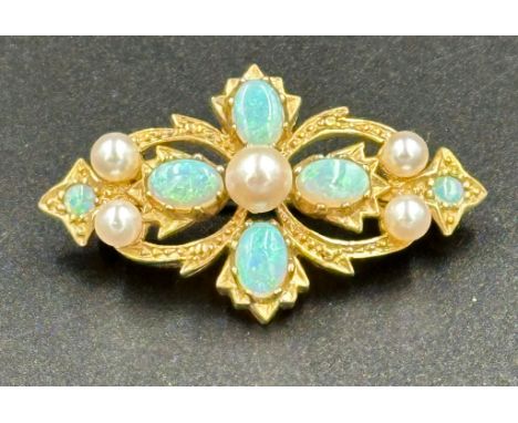 A 9ct gold opal and pearl brooch with an approximate weight of 5.8g and 35mm wide