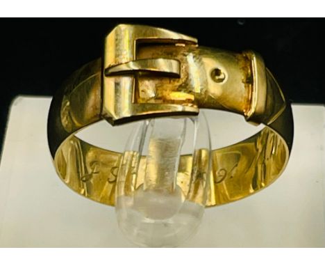 A 9ct gold buckle themed ring, size 1 approximate total weight 5.1g
