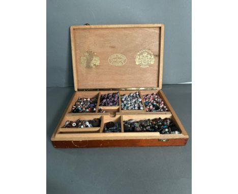 A box containing a quantity of Peruvian ceramic beads