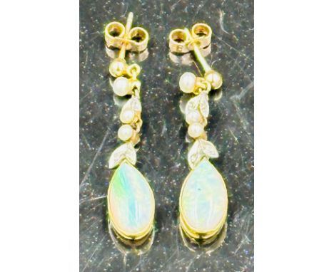 A pair of opal and seed pearl earrings 
