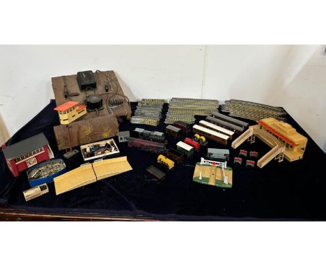 A selection of tin plate Hornby railway stock to include track, buildings, rolling stock and two engine 