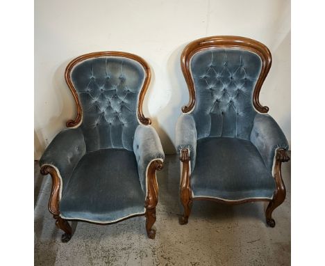 A pair of His and Her salon chairs, Button back and scrolly frame