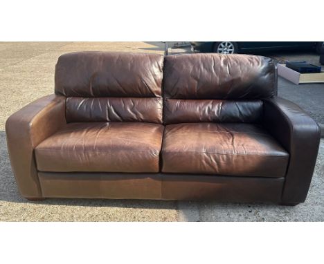 A two seater brown leather sofa (W200cm D91cm H95cm)