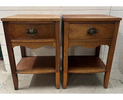 A pair of Edwardian style bedside tables with single drawers, shelf under on fluted legs H69cm 