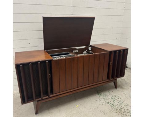 A Mid Century Zenith record player cabinet with louvre doors (H77cm W165cm D51cm)