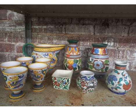 SHELF OF ITALIAN STYLE POTTERY