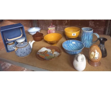 SHELF WITH STUDIO POTTERY, ORIENTAL ITEMS INCL: A PLATE, TEA POT WITH 2 CUPS IN BOX &amp; A LARGE STONE EGG WITH 2 OWLS