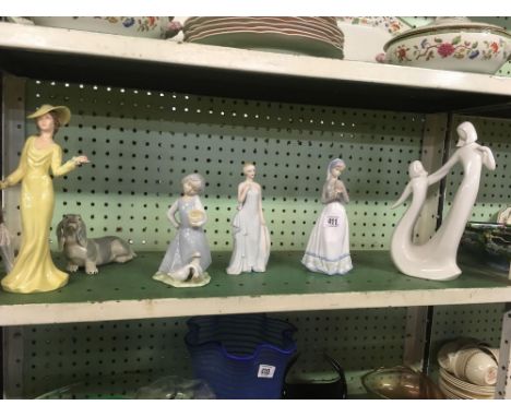 SHELF OF CHINA FIGURINES 