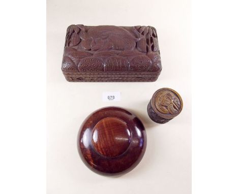 An Eastern box carved jungle beast, a circular wooden inkwell with advertising for H Addison and Co Wellington, Salop and a s