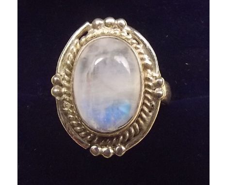A silver and rainbow moonstone ring, size N