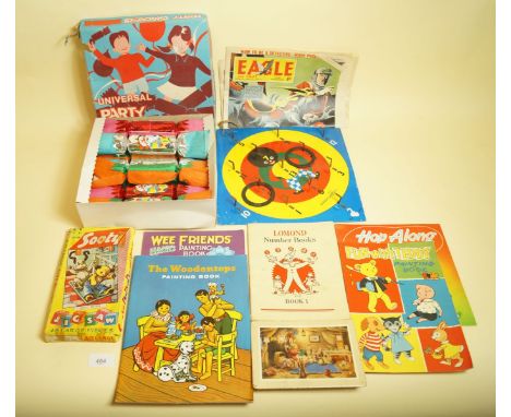 A Chad Valley Golly Hoopla game, various magic painting books, Sooty jigsaw and set of vintage crackers