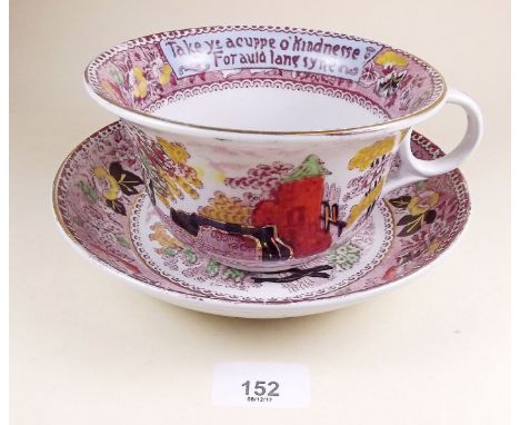 A Wilkinson giant sized breakfast cup and saucer with text to rim