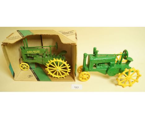 An Ertl John Deer tractor - boxed and another unboxed