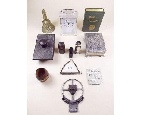 A group of small collectables including a dog whistle, travel inkwell, savings bank etc