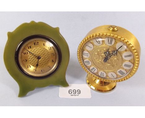 An Imhof gilt alarm clock and a 1930's Bakelite travel clock