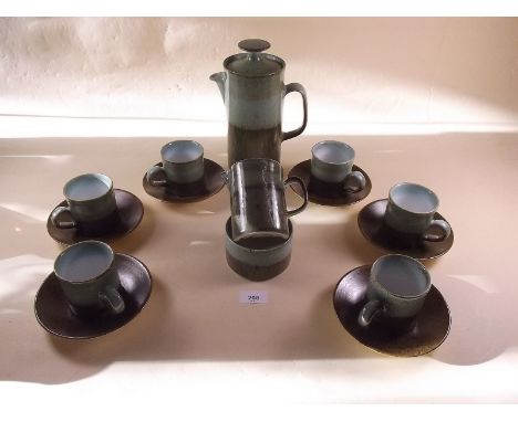 An Iden Rye pottery coffee service comprising coffee pot, six cups and saucers, sugar and milk