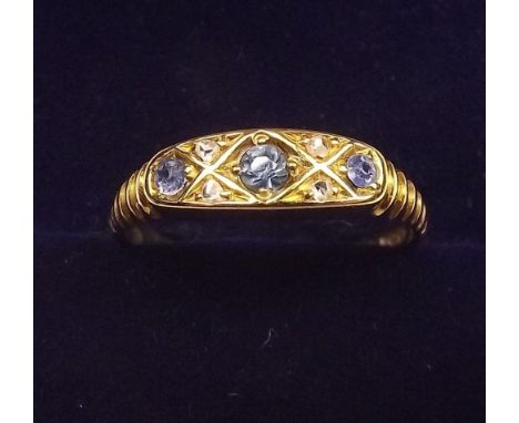 A 9 carat gold sapphire and diamond ring, size N