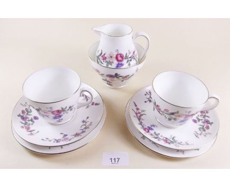 A Wedgwood Devon Sprays tea service comprising: six cups and saucers, six tea plates, cake plate, sugar and milk