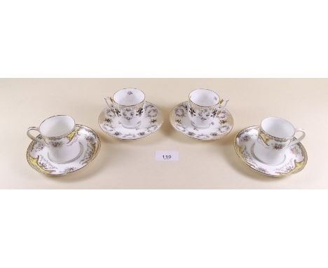 Three Edwardian Coalport floral printed coffee cans and saucers and five Kenmore floral coffee cans and saucers