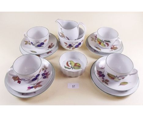 A group of Royal Worcester Evesham comprising: four cups and saucers, four tea plates, sugar etc