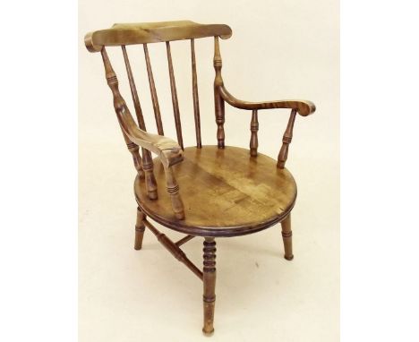 An Edwardian beech stick back armchair - cut down