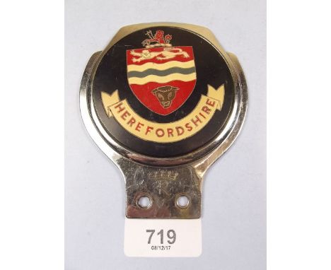 A vintage chrome Herefordshire car badge