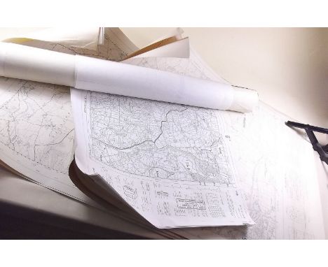 A group of unframed Ordnance Survey Maps