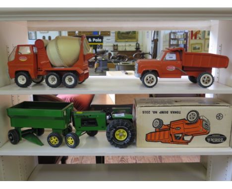 A Tonka Dump Truck no 2315 in original box, a Tonka tractor and trailer and a cement mixer (3)
